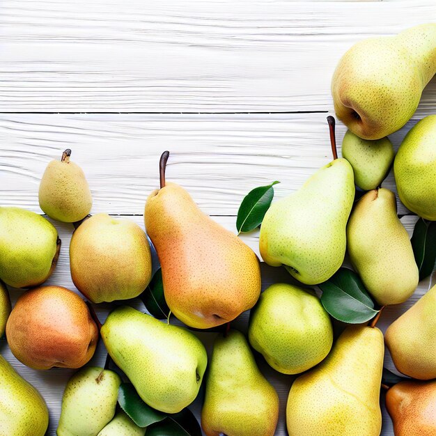 Photo poires fraîches un grand ensemble de fruits poires espace libre pour le texte sur une vue de dessus de fond en bois blanc