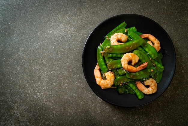 Pois verts sautés aux crevettes