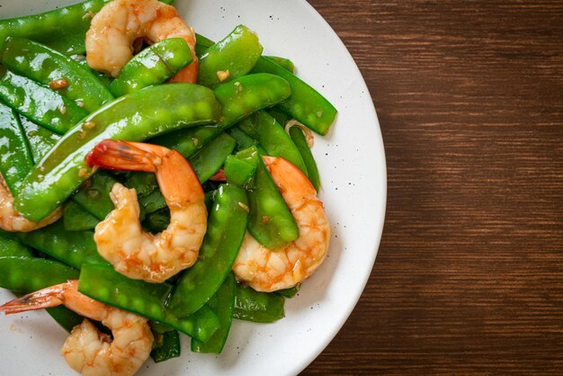 Pois verts sautés aux crevettes