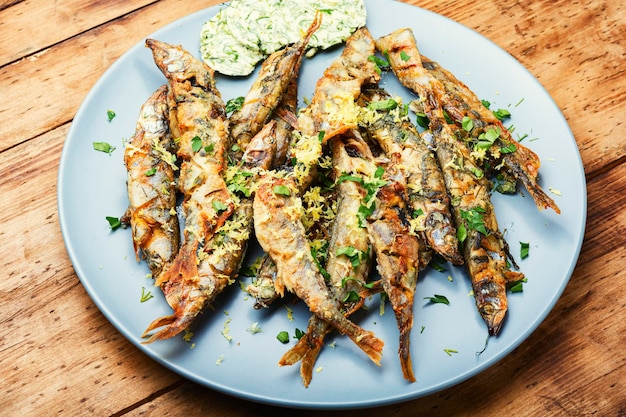 Poisson de capelan rôti aux herbes et zeste de citron