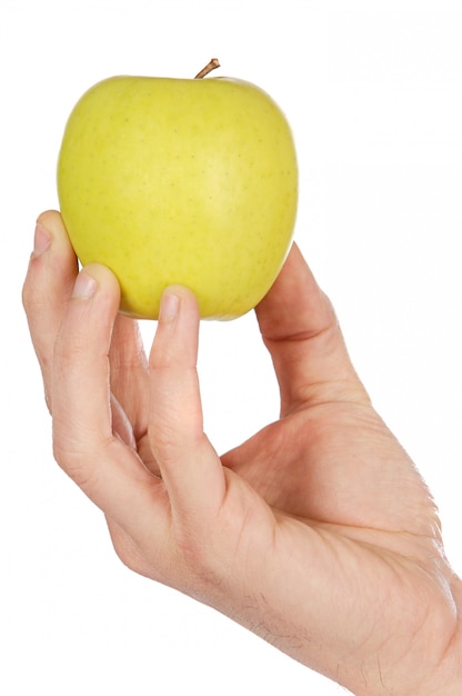 Pomme dans une main pauvre en calories fond blanc