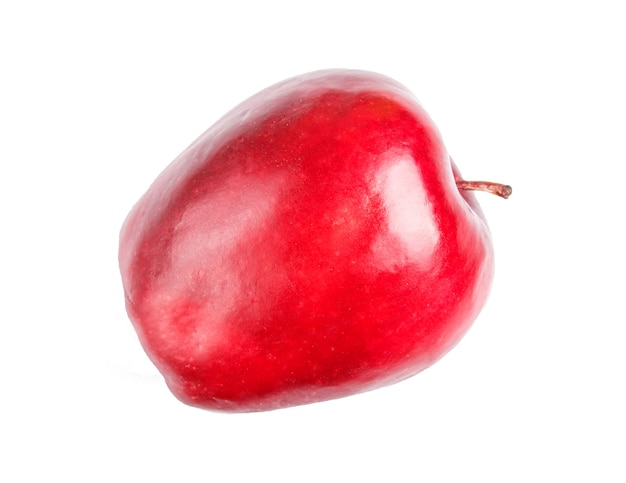 Une pomme rouge isolée sur une surface blanche