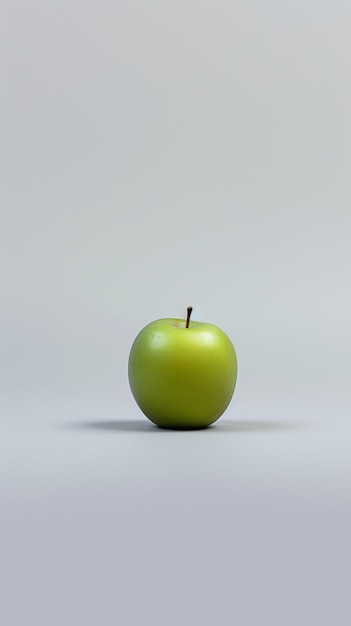 Pomme verte sur une table blanche