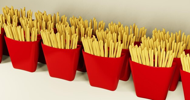 Photo des pommes de terre frites dans une boîte rouge.