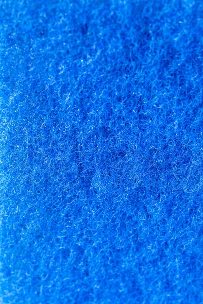 Éponge à récurer bleu texture abstrait fond vertical