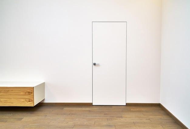 Porte intérieure invisible Système de solution de porte cachée à cadre en aluminium dans un intérieur contemporain