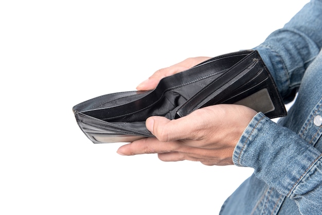 Photo portefeuille noir qui représente de nombreux dollars américains entre les mains de jeunes qui portent des jeans.