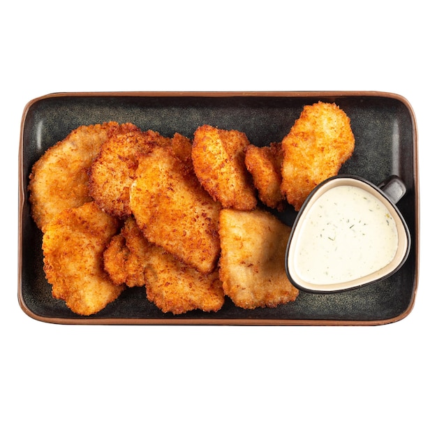 Une portion de nuggets de poulet frit avec sauce