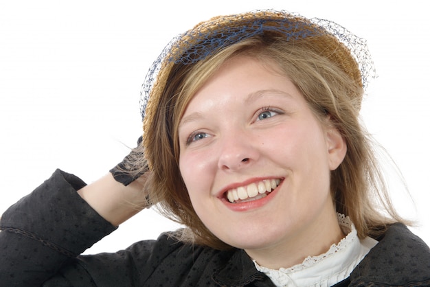 Portrait d'une belle femme avec des vêtements vintage