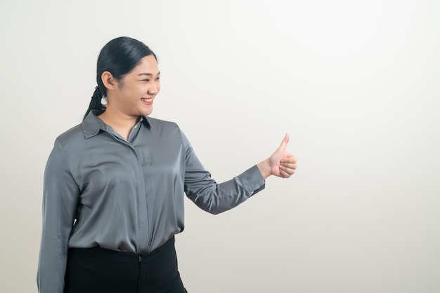 portrait, femme asiatique, à, pouce haut, fond blanc