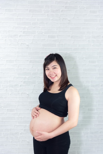 Portrait de femme enceinte en Asie