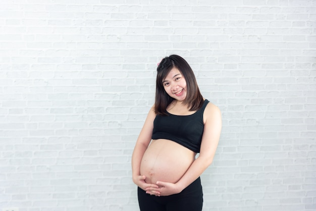 Portrait de femme enceinte en Asie