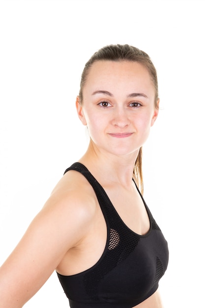 Portrait de jeune femme sportive fille sur blanc