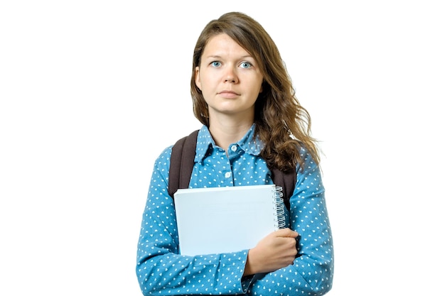 Portrait de jeune fille étudiante avec livres et sac à dos