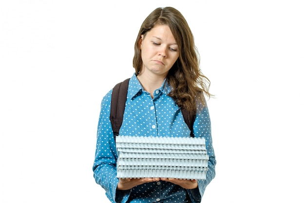 Portrait de jeune fille triste étudiante avec des livres