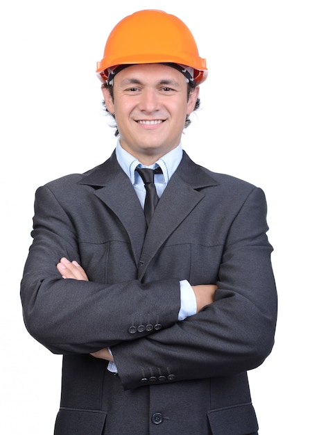 Portrait de joyeux jeune ingénieur en casque.