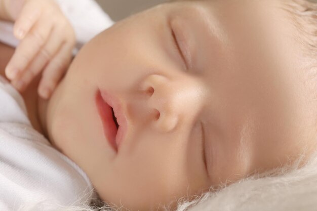 Portrait of cute baby sleeping closeup