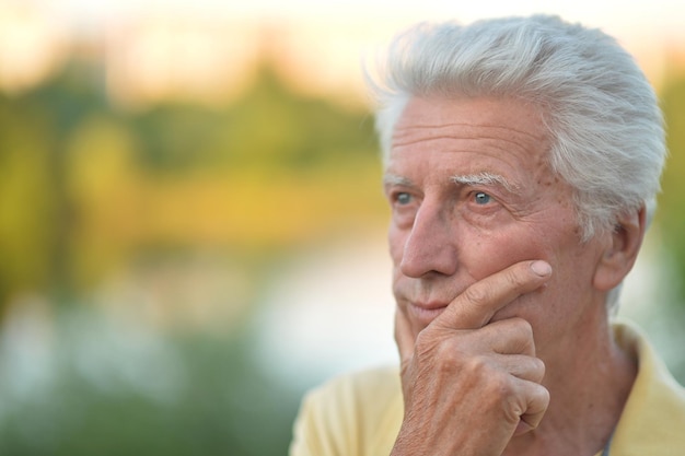 Portrait of senior man in park