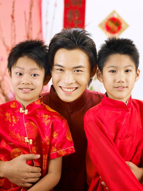 Photo portrait d'un père avec ses fils