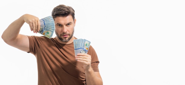 Portrait en studio d'homme d'affaires avec un tas de billets en dollars Concept d'argent en dollars Entreprise de richesse de carrière Bannière en dollars en espèces