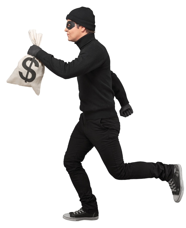 Photo portrait d'un voleur s'exécutant avec un sac d'argent