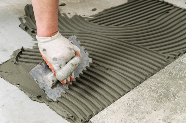 Pose De Carreaux De Céramique.