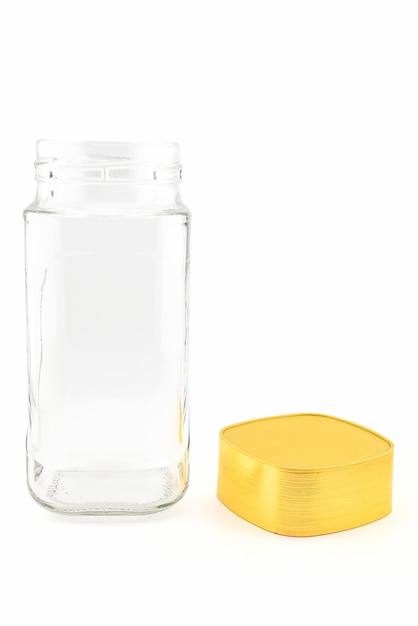 pot de verre vide avec un bouchon à vis en plastique jaune