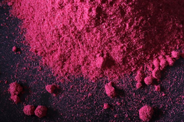 Photo poudre de framboise en gros plan en studio