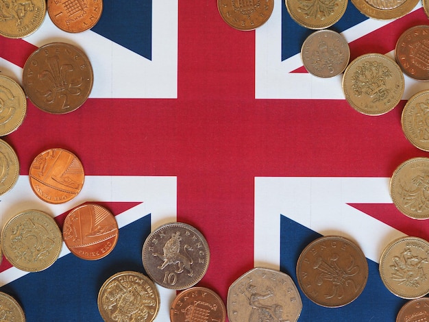 Photo pound coins, royaume-uni sur drapeau