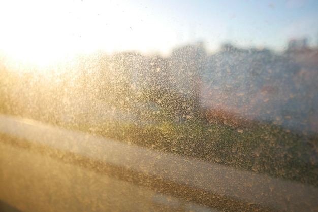 La poussière sur le verre de la fenêtre la texture de fond sale