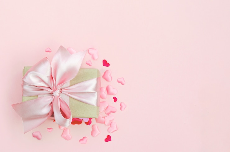 Photo présent avec noeud rose sur rose