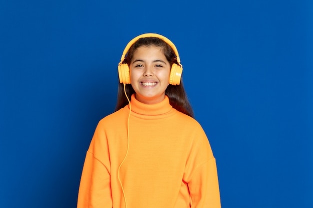 Preteen girl with yellow sweatshirt