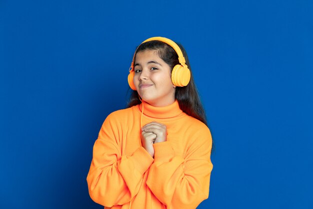 Preteen girl with yellow sweatshirt