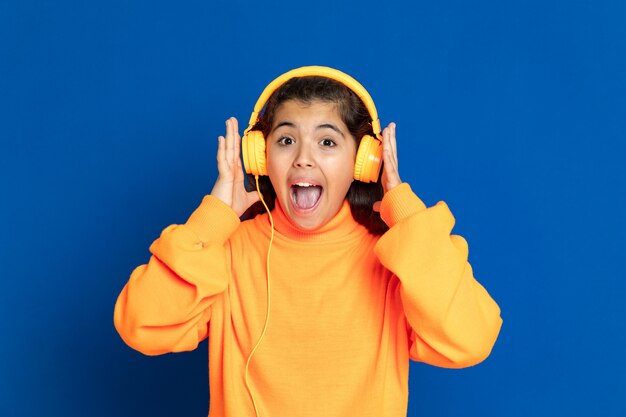 Preteen girl with yellow sweatshirt