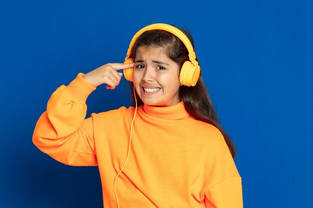 Preteen girl with yellow sweatshirt