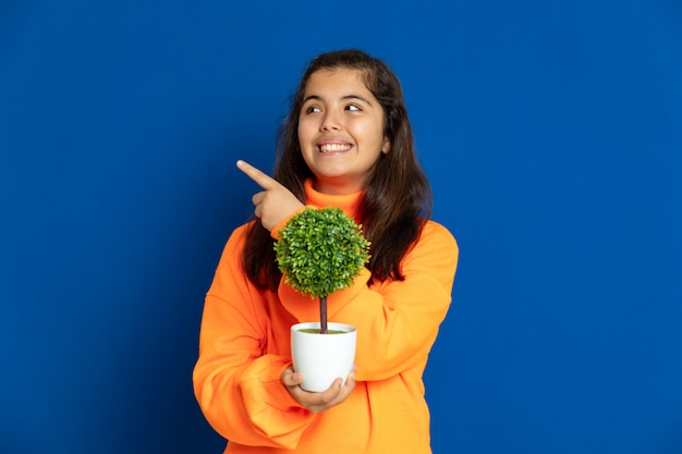 Preteen girl with yellow sweatshirt