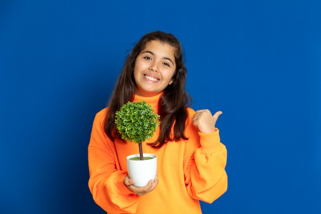 Preteen girl with yellow sweatshirt