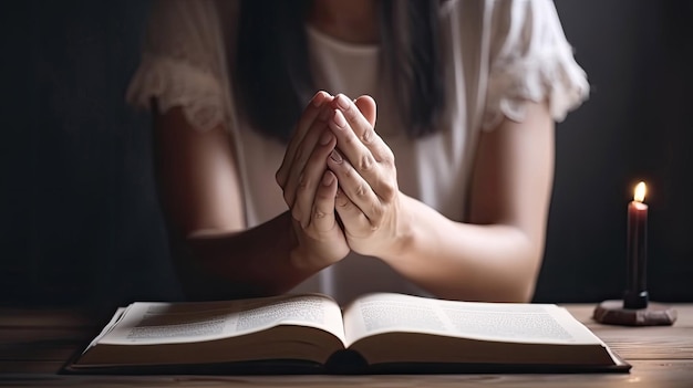 Prier les mains jeune femme prière avec les mains ensemble sur la sainte bible avec la technologie IA générative