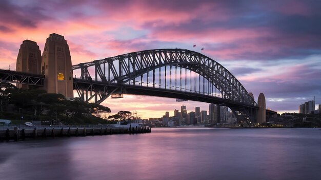 Photo une prise de vue à bas angle du pont du port de sydney en australie au coucher du soleil