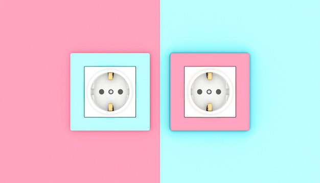 Prises électriques sur rose et bleu