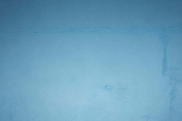 Photo profondeurs tranquilles une texture de mur bleue sereine évoquant le calme avec sa finition lisse et son dégradé subtil