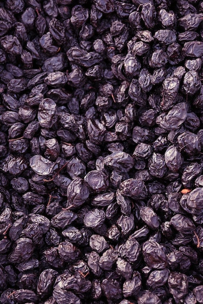 Prunes séchées savoureuses en arrière-plan