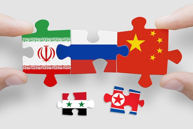 Puzzle composé de drapeaux d'Iran, de Russie et de Chine, de Syrie, de Corée du Nord, de Russie et de Chine