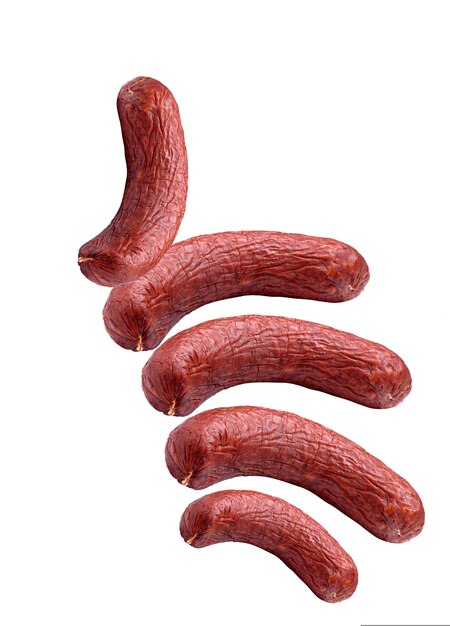 quatre saucisses sont montrées dans une rangée une a quelques longues longues lignes minces droites et droites
