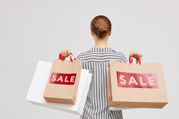 Quitter le magasin les mains pleines de sacs