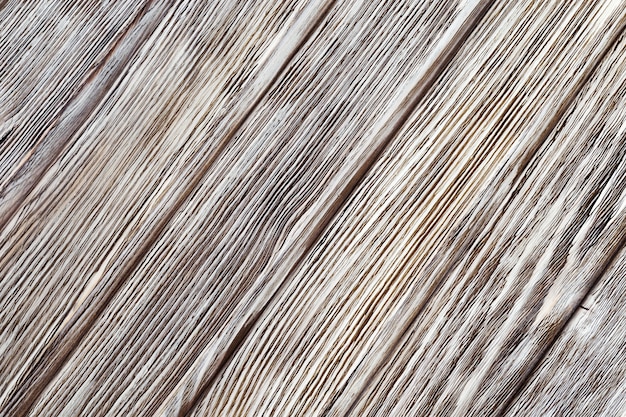 Rayures grises et blanches sur une surface peinte en bois