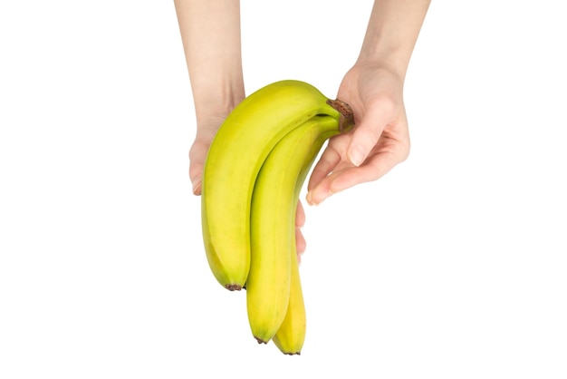 Un régime de bananes dans la main de femme isolé sur fond blanc