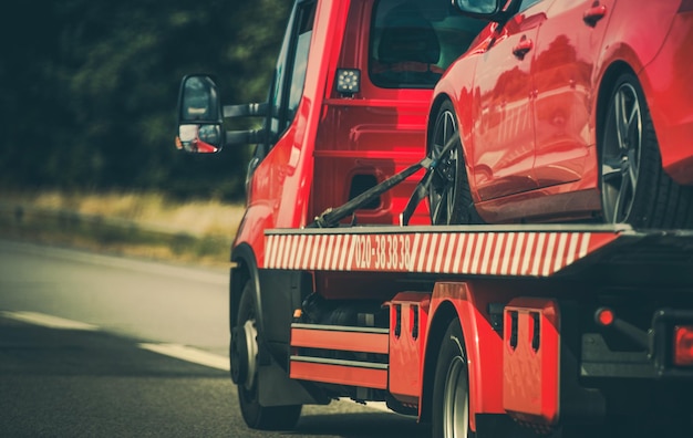 Photo remorquage d'un véhicule avec une voiture