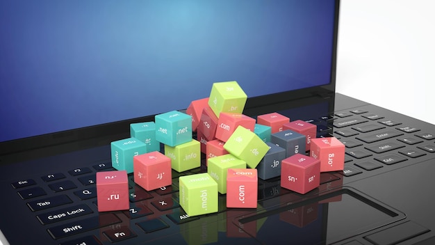Rendu 3D de cubes avec des noms de domaine sur le clavier d'un ordinateur portable noir