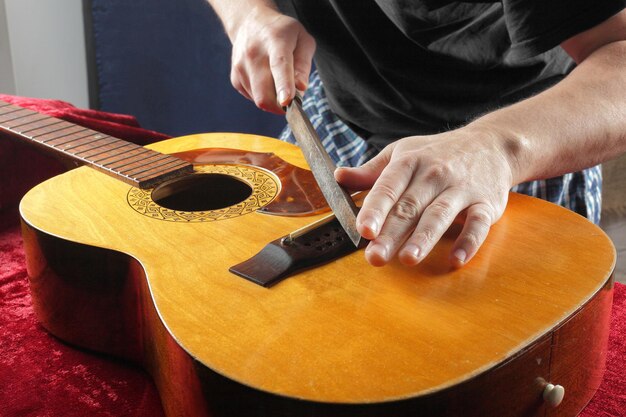 Réparation et entretien de guitare Meulage d'écrou de chevalet